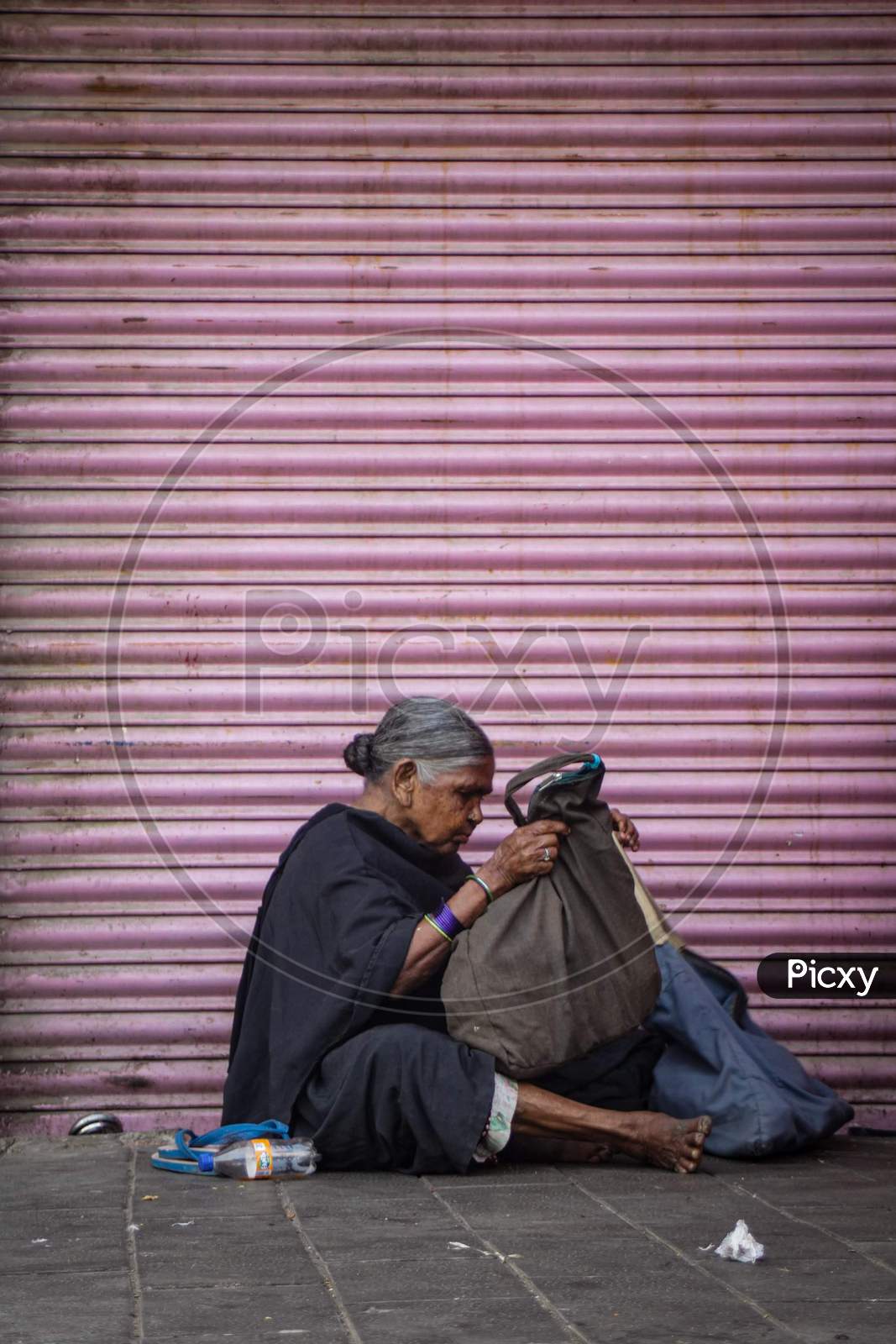 Old woman in Charminar streets