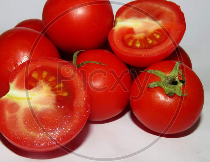 Tomatoes on a White background,Isolated Red Tomatoes,inside of the tomato,group of tomatoes,close up of vegetable, Fresh Red Tomatoes, Tomato slice,