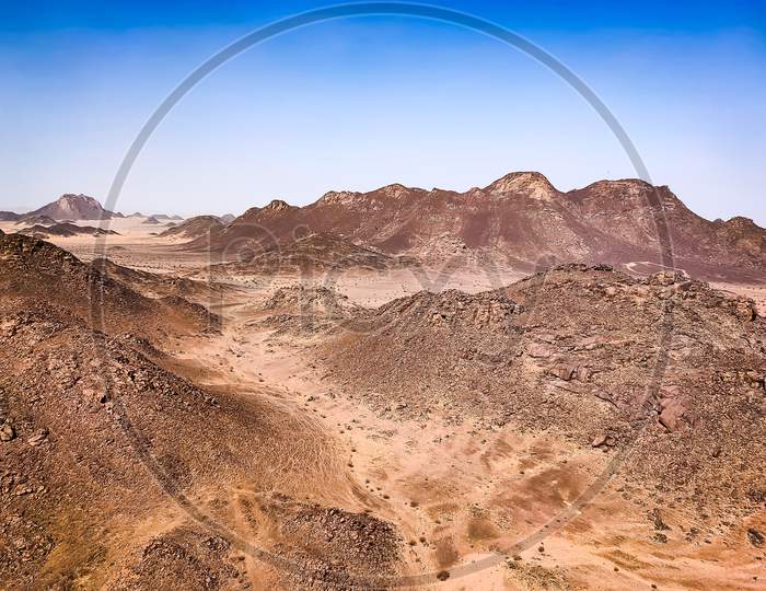Rocky mountain in Sahara desert. Landscape view.