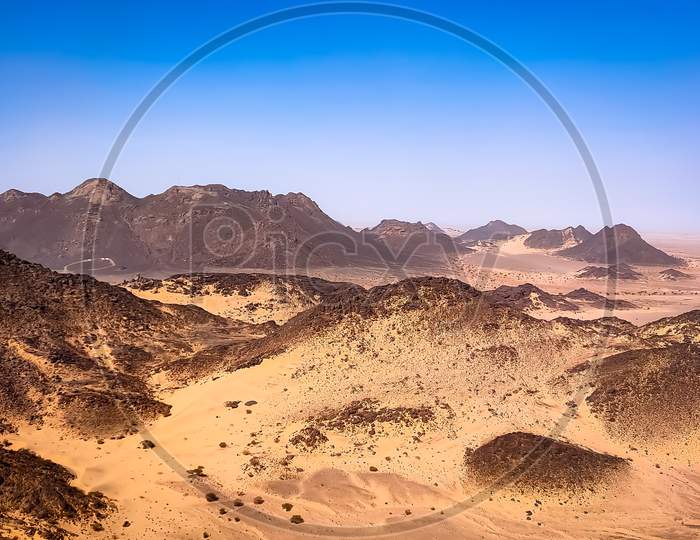 Landscape view of rocky mountain in Sahara desert.
