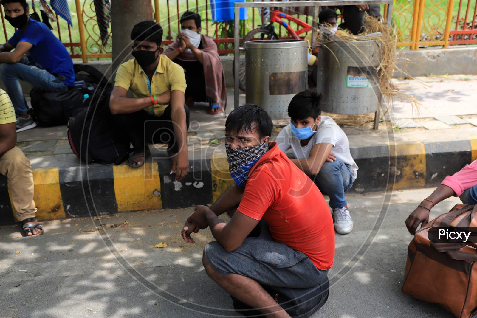 Migrant Workers Resting On Roads As They Walk To Their Native Places During Extended Nationwide Lockdown Amidst Coronavirus Or COVID-19 Pandemic in Prayagraj