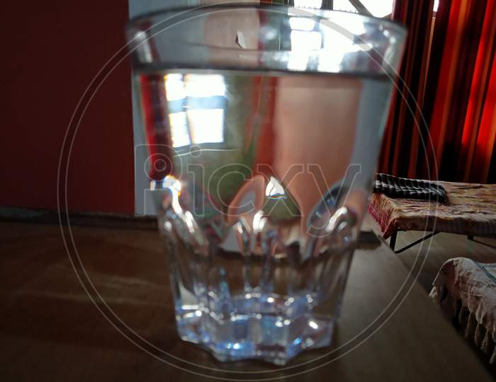 A glass full of water or Vodka