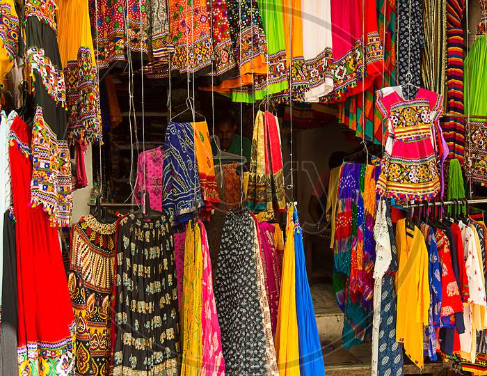 Pushkar, Rajasthan, India - November 14, 2019: Colorful India Style Traditional Ethnic Clothes Shop In The Local Market.