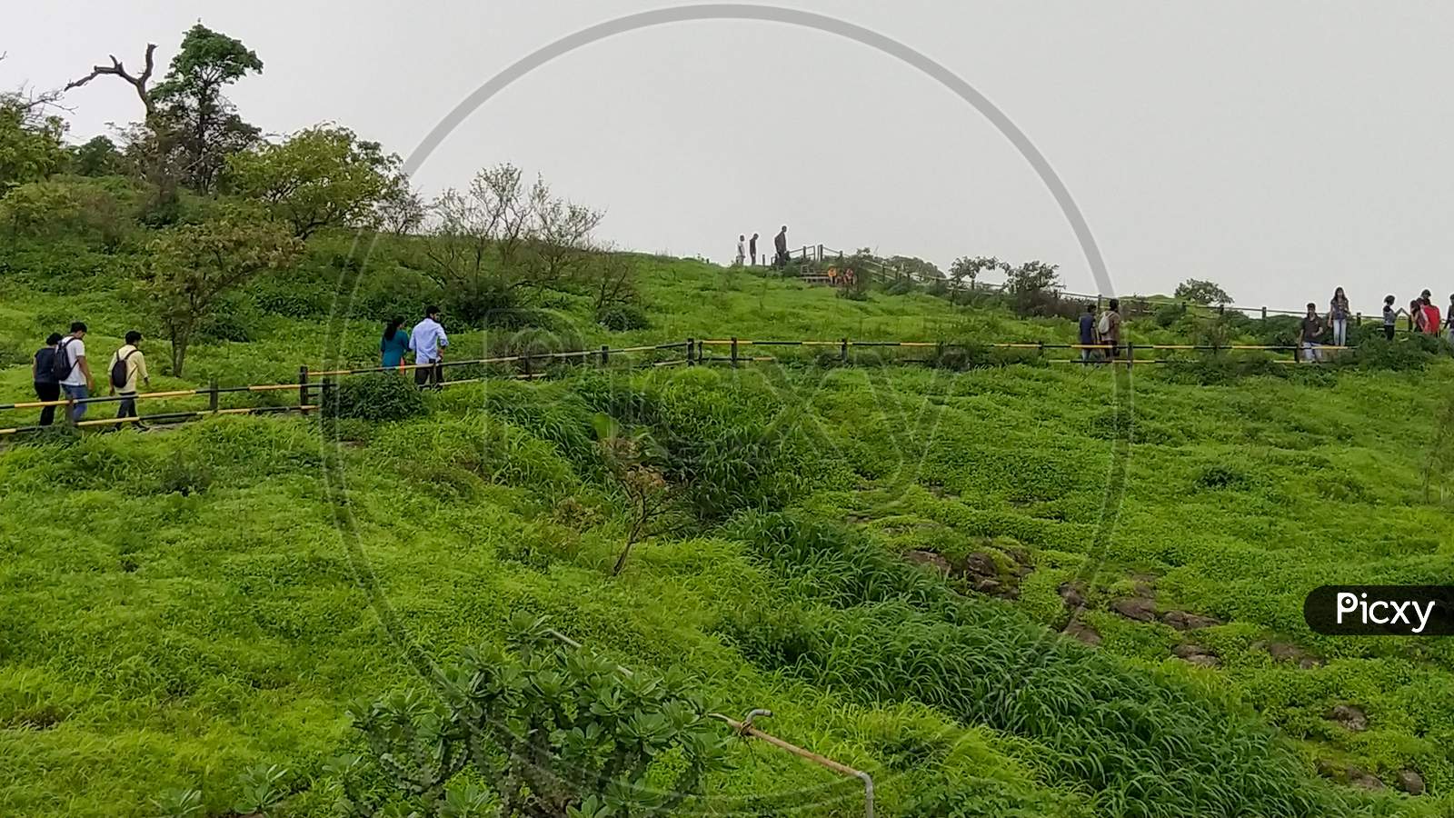 Tourists at sinhagad fort in monsoon