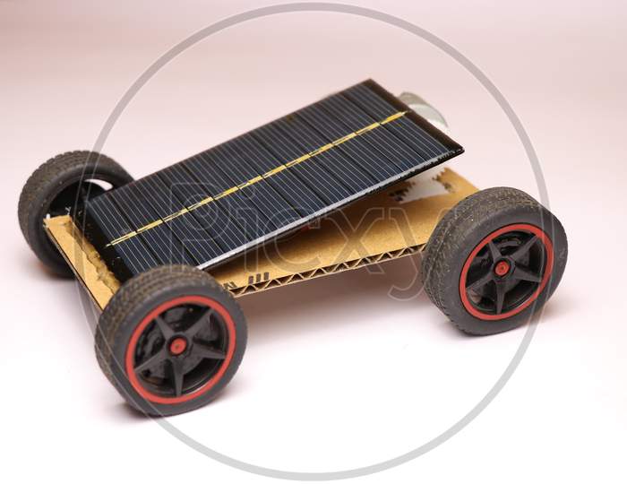 Small Solar Powered Car With Mini Solar Cells Panel At The Top.This Is A Home Made Solar Powered Car