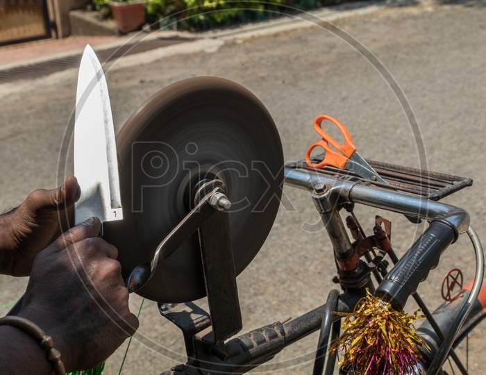 Sharpening A Glossy Kitchen Knife On Water Stone In India