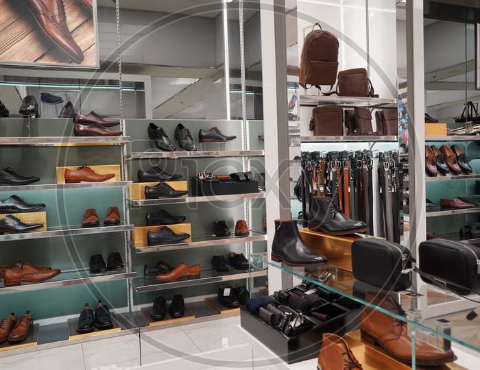 Dubai Uae December 2019 - Men Shoes In A Luxury Store. Set Of Black And Brown Mens Luxury Shoes Bags In The Store. Mens Footwear. Men Elegant Shoes In A Store.