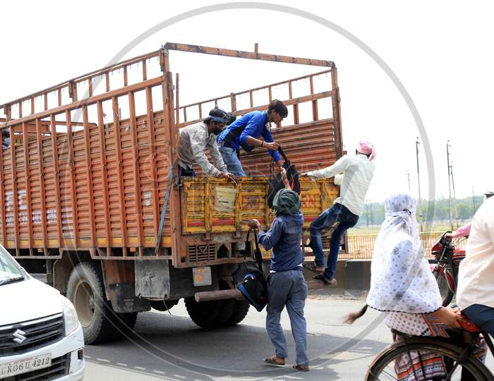 Migrant Workers Travelling By Trucks  To Their Native Places During Extended Nationwide Lockdown Amidst Coronavirus Or COVID-19 Pandemic in Prayagraj