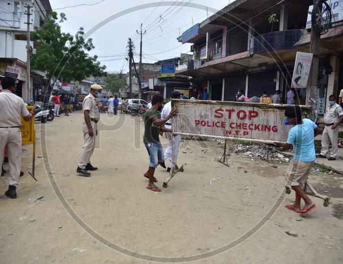 Security Personnel Ask Shopkeepers To Close Their Shops at a Containment Zone near Barabazar Area, Nagaon