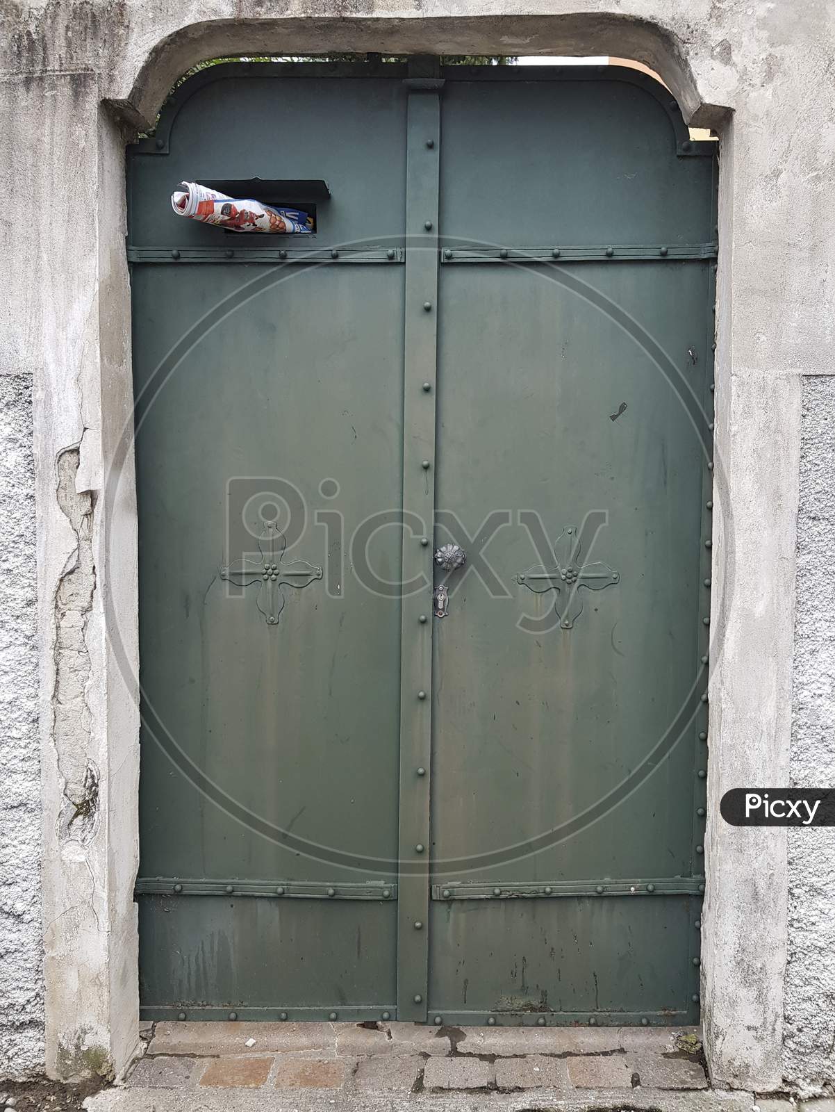 Old Style Green Metal Door