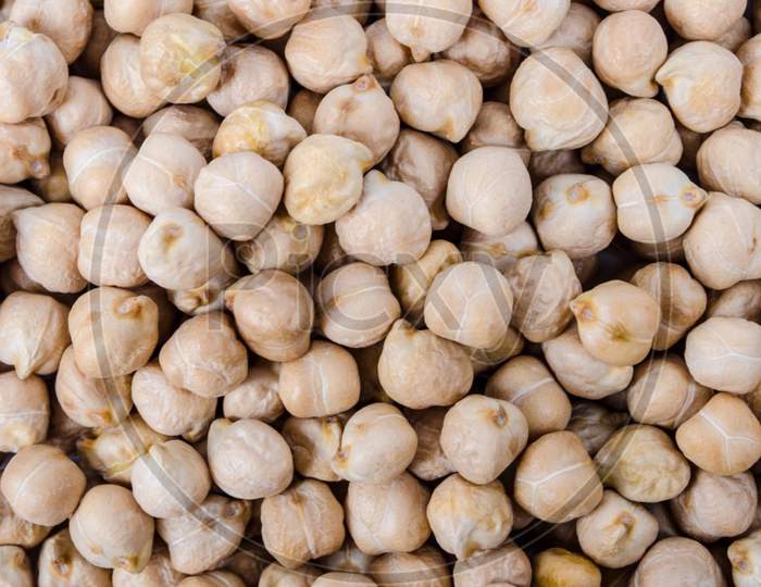 Background of dry chick peas.top view.