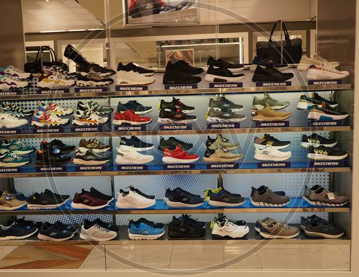 Dubai Uae December 2019 Skechers Brand Sport Shoes At A Shop. Footwear Of Various Brands In The Mall. Big Collection Of Different Sport Shoes.