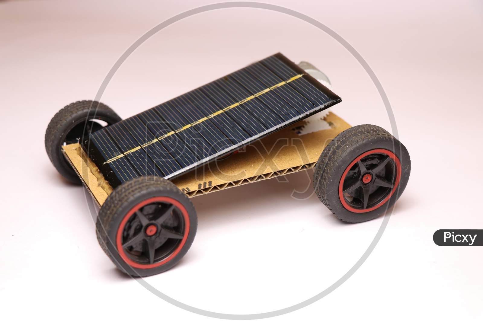Small Solar Powered Car With Mini Solar Cells Panel At The Top.This Is A Home Made Solar Powered Car