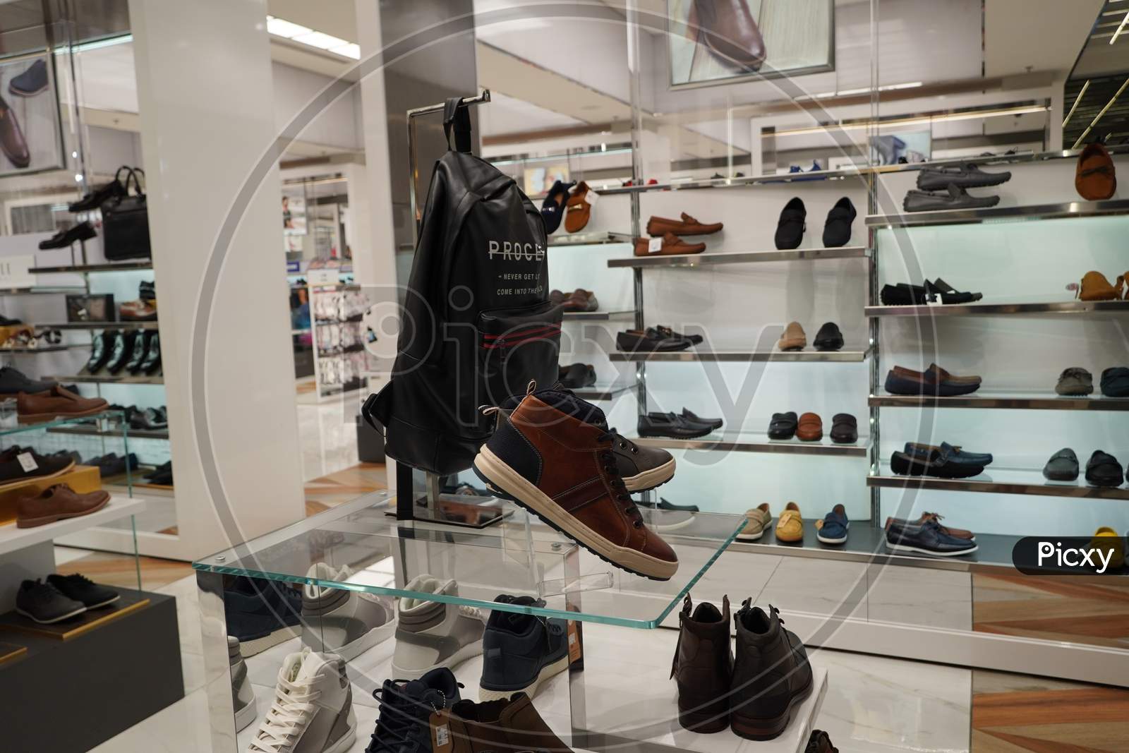 Dubai Uae December 2019 - Men Shoes In A Luxury Store. Set Of Black And Brown Mens Luxury Shoes Bags In The Store. Mens Footwear. Men Elegant Shoes In A Store.