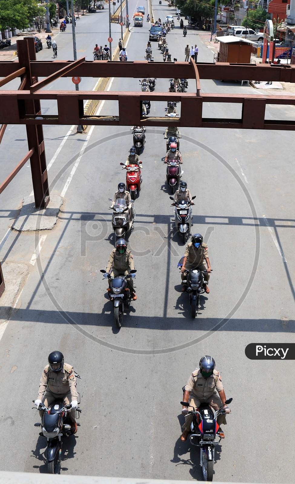 Police personnel take part in a flag march during a government-imposed nationwide lockdown as a preventive measure against the COVID-19 or Coronavirus in Prayagraj, May 2, 2020.