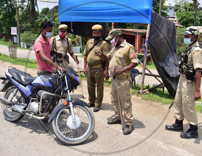 Security Personnel Checking Documents Of Commuters  During  Nationwide Lockdown Amidst Coronavirus or COVID-19  Pandemic  At Raha In Nagaon District Of Assam  On May 2,2020