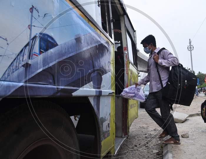 Migrant Workers from Bihar, Jharkhand and UP board a bus after  registering from Cyberabad Police to get onto a Shramik Special Train during ongoing Nationwide Lockdown amid Coronavirus Pandemic, Kukatpally,Hyderabad, May 19,2020.