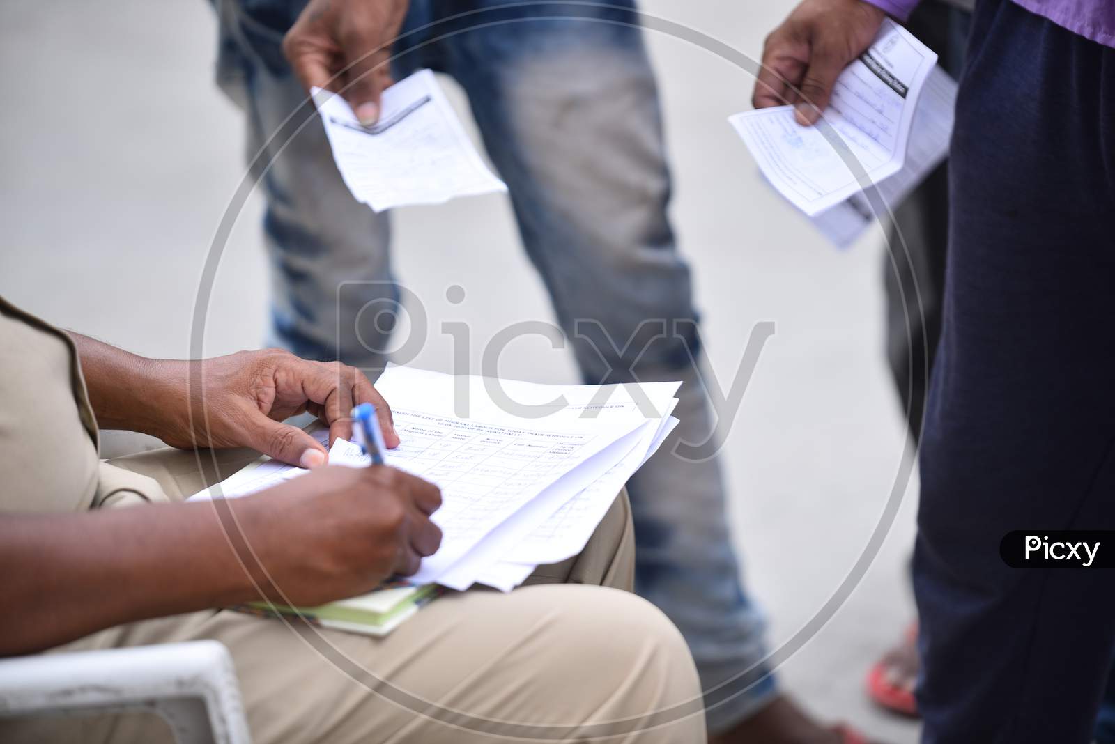 Migrant Workers get themselves registered for the boarding of Shramik Special Trains that ferry them from Secunderabad Railway station to their respective Districts in Jharkhand, Bihar and Uttar Pradesh, Hyderabad, May 19,2020
