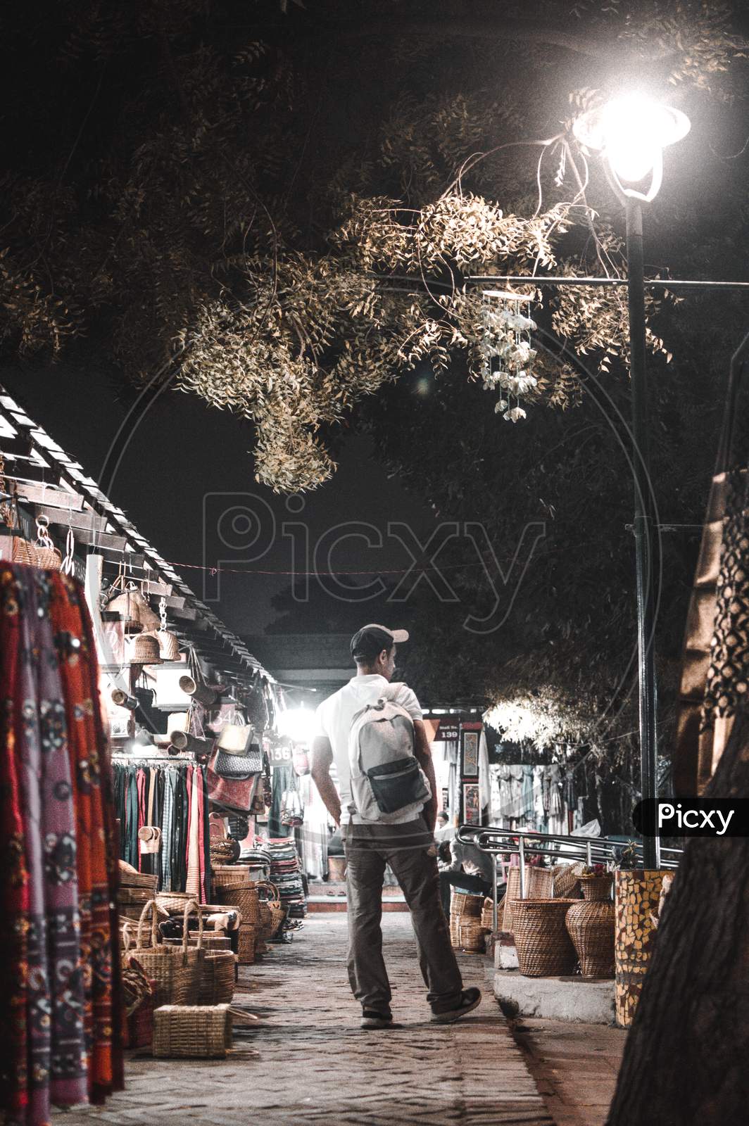 Boy walking in a market