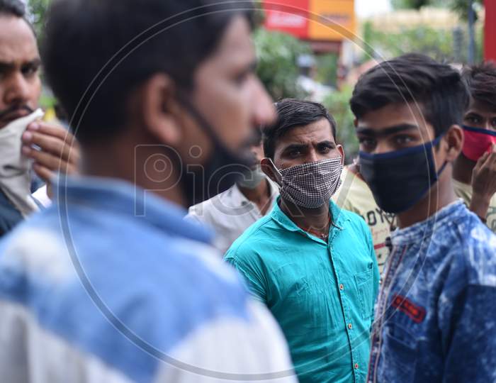 Migrant Workers from Bihar, Jharkhand and UP wait to register from Cyberabad Police to get onto a Shramik Special Train during ongoing Nationwide Lockdown amid Coronavirus Pandemic, Kukatpally,Hyderabad, May 19,2020.