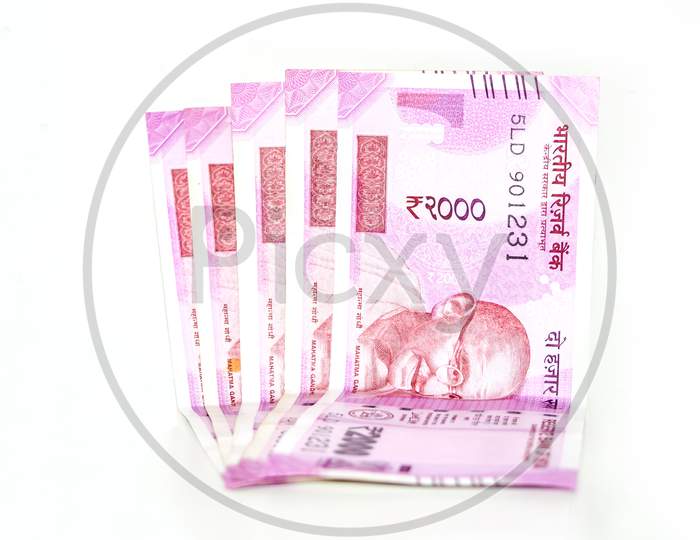 Indian paper currency notes or money on isolate white background. new Indian rupees