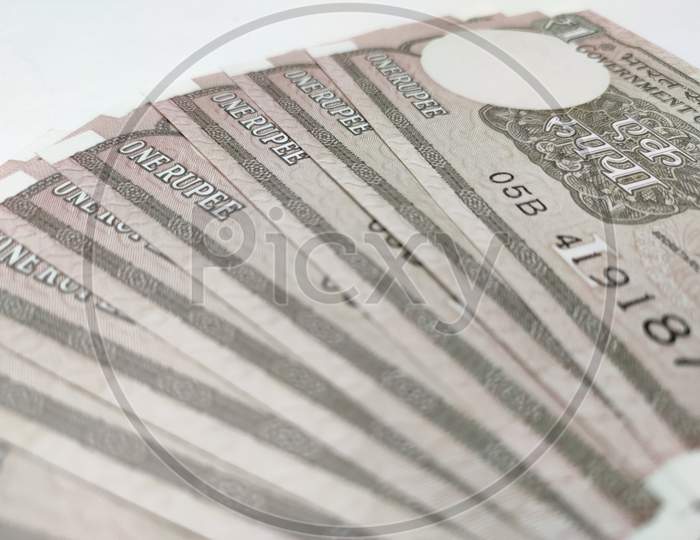 Close up view of one rupee banknotes isolated on white background. Indian One (1) rupee banknotes