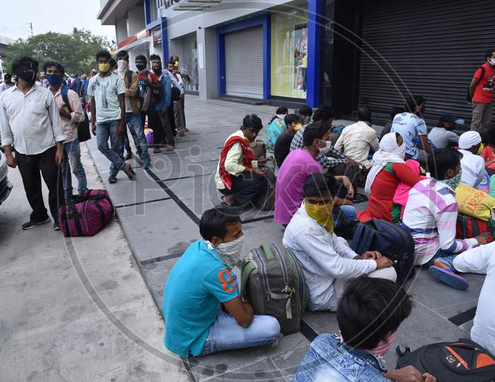 Migrant Workers from Bihar, Jharkhand and UP wait to get registered from Cyberabad Police to get onto a Shramik Special Train during ongoing Nationwide Lockdown amid Coronavirus Pandemic, Kukatpally,Hyderabad, May 19,2020.