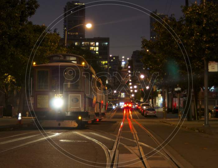 A Night Picture Of A Typical Streetcar Of San Francisco