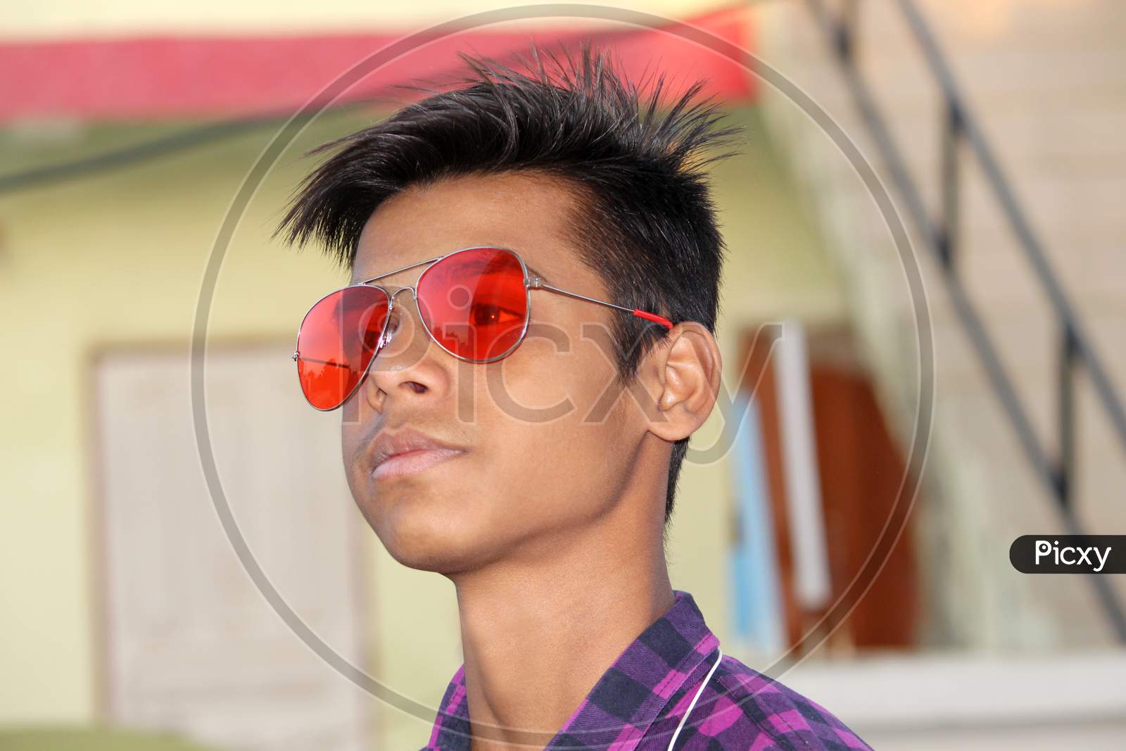 portrait of teen age Asian guy looking with stylish pose