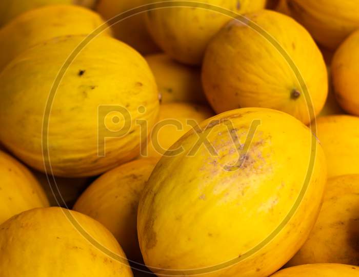 Yellow Rind Melons In The Market Fresh Fruit.