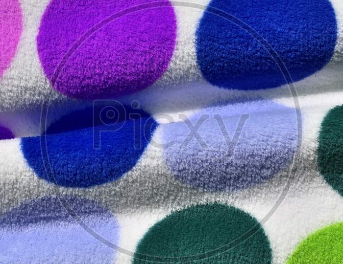Detailed close up view on colorful textiles and fabrics texture in high resolution