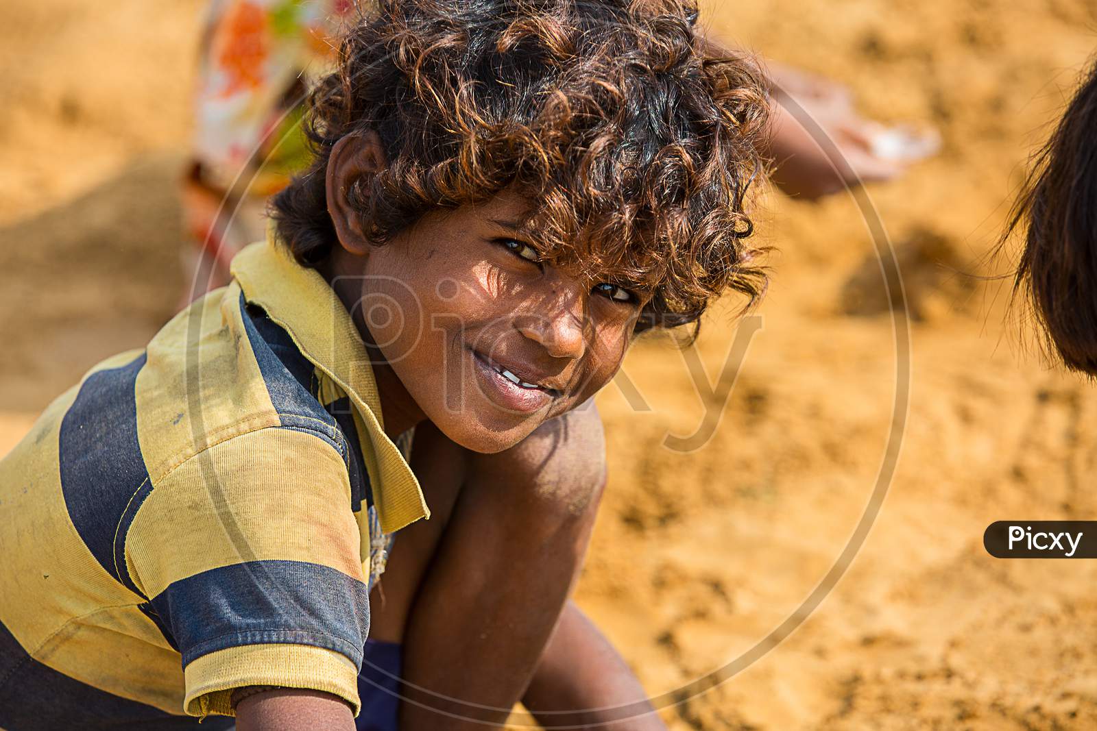 Jodhpur, Rajasthan, India - June 18Th, 2019: Closeup Poor Rural Boy Kid Smiling Towards Camera, Poverty Unprivileged Indian Children.