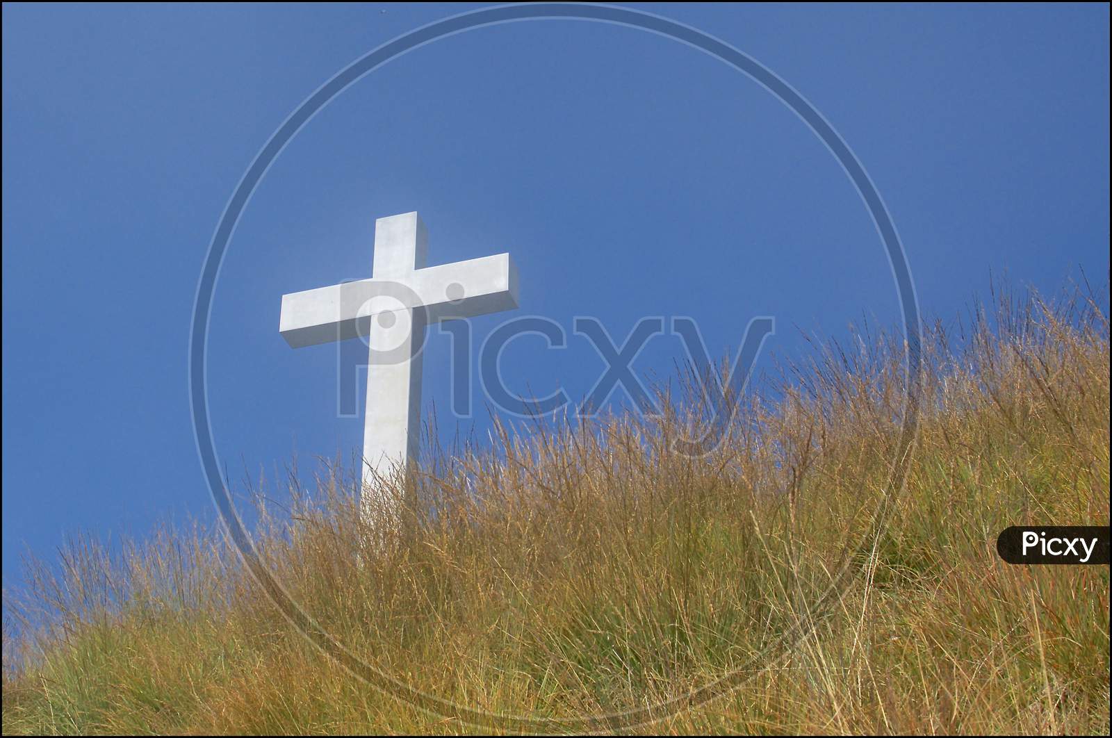 Religious Cross Against Blue Sky