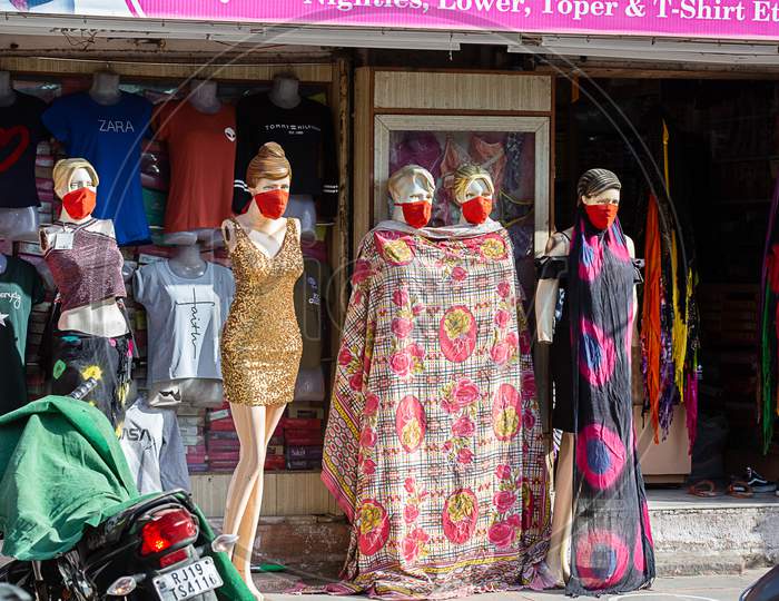 Jodhpur, Rajasthan, India - May 20 2020: Mannequins With Mask On Face. Shops Are Reopening After Lock Down Restrictions Due To The Covid-19 Pandemic, Back To Normal Life With Few Safety Measure.