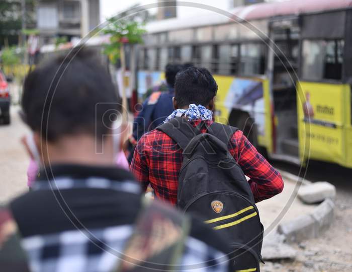 Migrant Workers from Bihar board a bus after registering from Cyberabad Police to get onto a Shramik Special Train during ongoing Nationwide Lockdown amid Coronavirus Pandemic, Kukatpally,Hyderabad, May 19,2020.