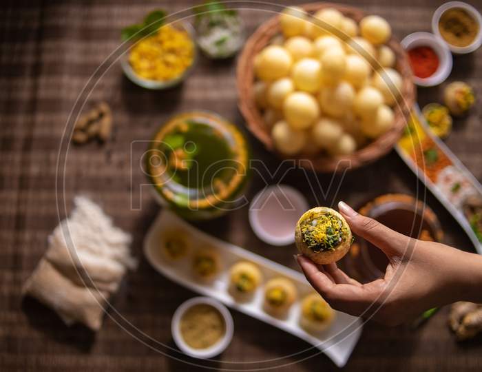 Panipuri or Phuchka is a type of snack that originated in the Indian subcontinent.