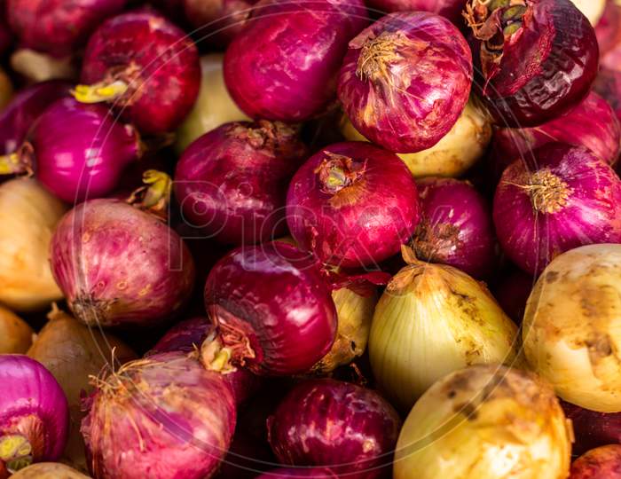 Red Onions In Unpeeled. Fresh Vegetables For Cooking. Organic Food.