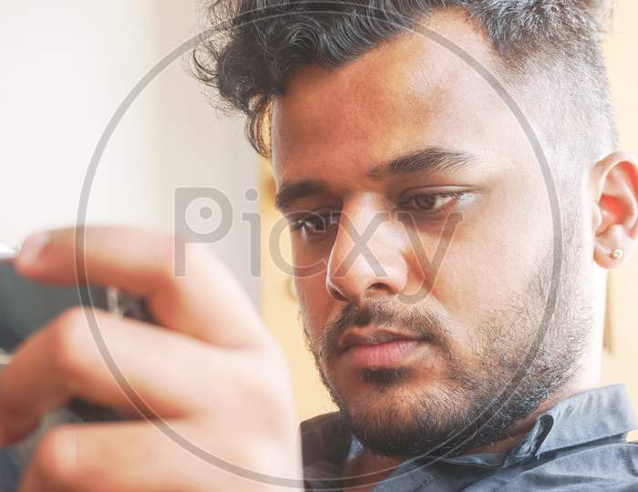 young man with a mobile phone
