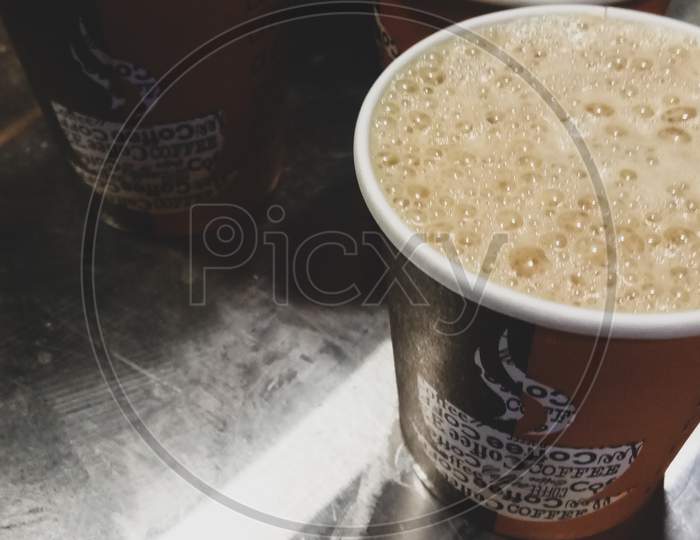 Hot coffee in a 4 plastic cup