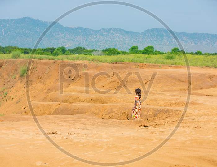 Jodhpur, Rajasthan, India - June 18Th, 2019: Poor Rural Kids Walking On Sand In Hot Summer Outdoor, Poverty Unprivileged Indian Children.