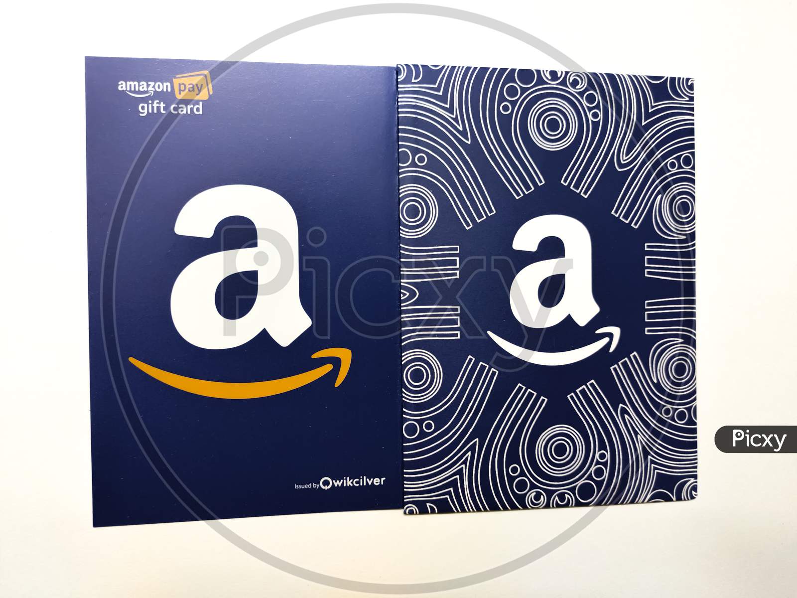 Amazon gift card isolated on white background with space for text, which allows the recipient to purchase items from the Amazon.com website