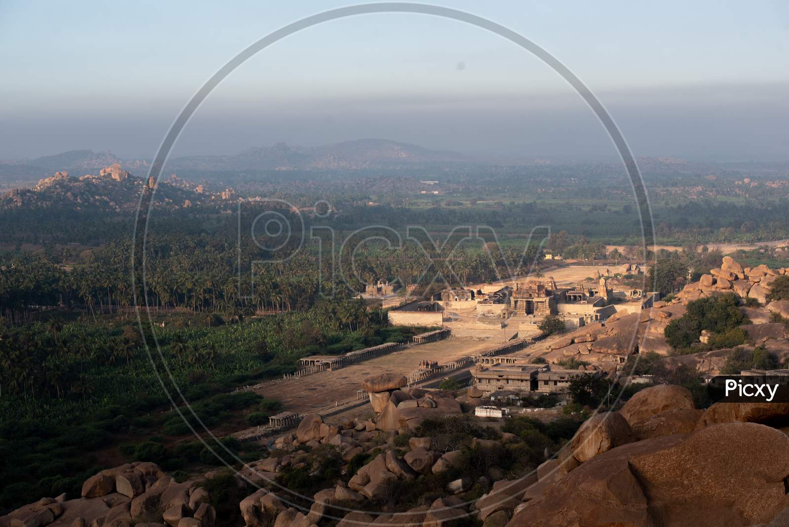 Aerial View Of Old Ruins Of Hampi temple With Rock hill Chain in Hampi, Karnataka