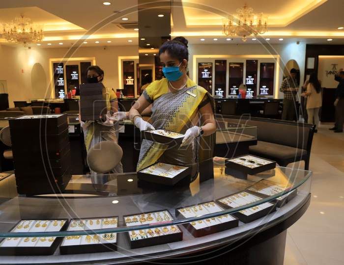 A Sales Girl  Arranges Jewellery At A Shop After  Authorities Allowed Shopkeepers To Open Their Establishments With Certain Restrictions During Coronavirus or COVID-19 Pandemic in Prayagraj, May 20,2020