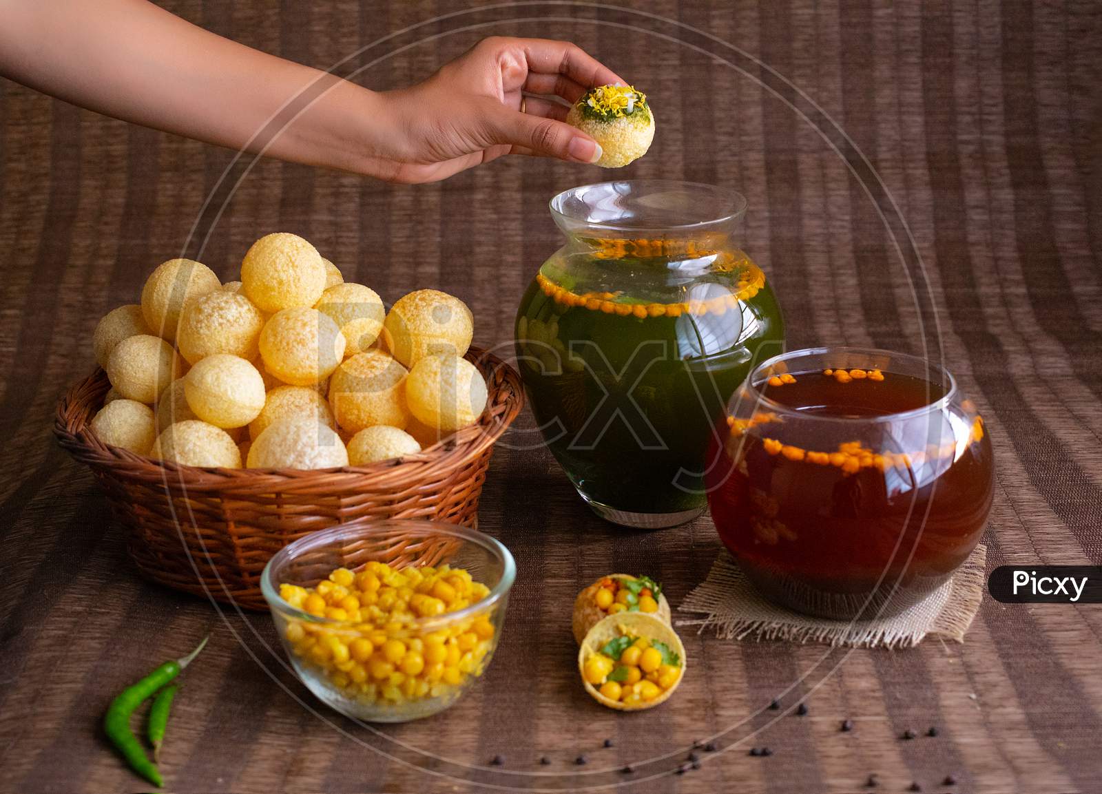 Panipuri or Phuchka is a type of snack that originated in the Indian subcontinent.