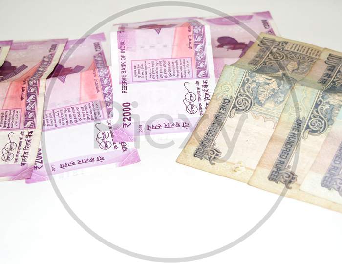 Indian paper currency notes or money on isolate white background. new Indian rupees