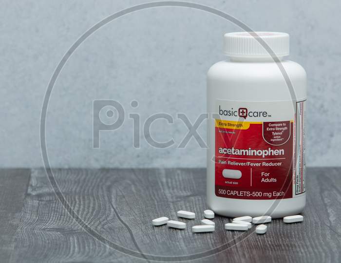 Bottle Of Generic Brand Acetaminophen On Table