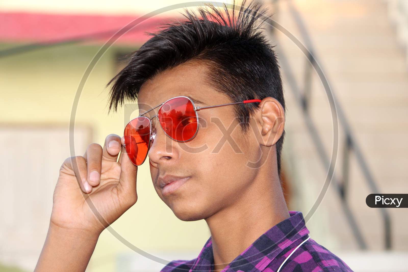portrait of teen age Asian guy looking with stylish pose