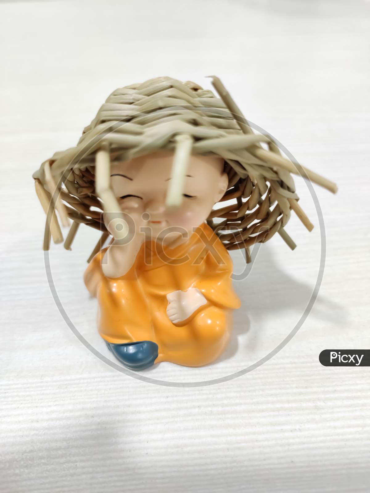 Small Buddha Statue Monk With Straw Hat Resin