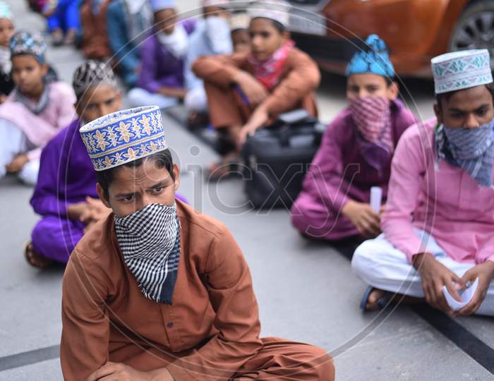 Muslim students from Bihar who study in a Madrassa (Madarsa) in Borabanda, Hyderabad wait for registering with Police to board a Sharamik Special Train from Secunderabad. Kukatpally Y Junction, Hyderabad, May 19,2020.