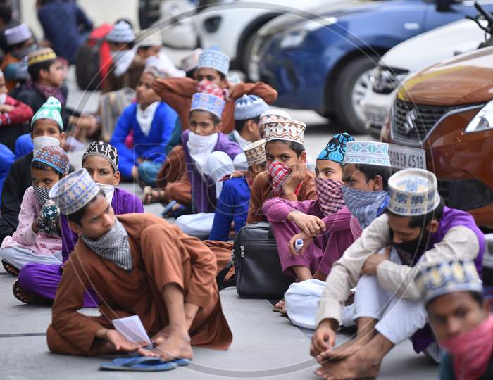 Muslim Students from Bihar who study in a Madrassa (Madarsa) in Borabanda,Hyderabad wait to register themselves for a Shramik Special Train that ferries them from Secunderabad Railway Station to Bihar amid fears of Coronavirus